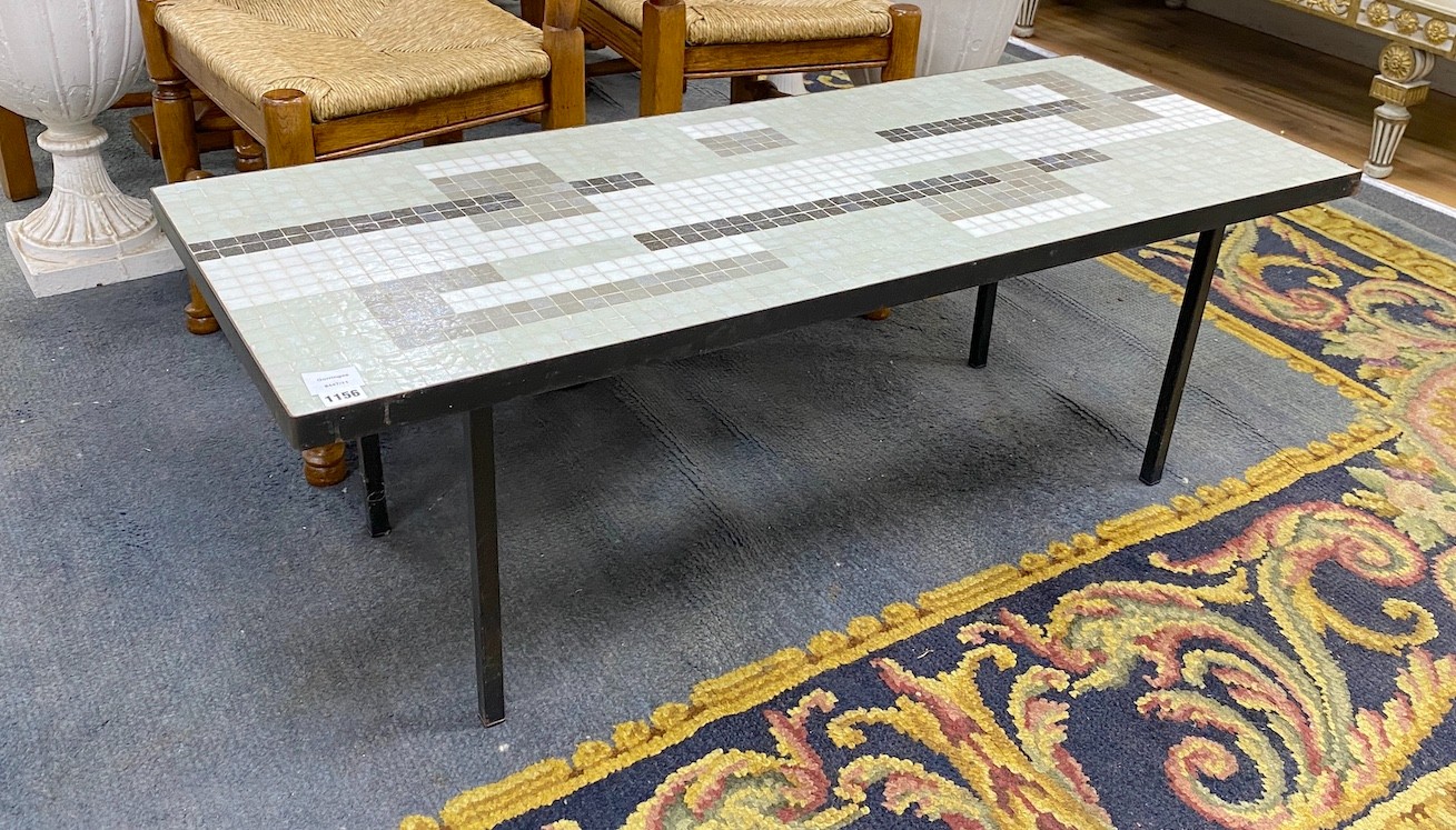 A 1950's wrought iron rectangular tiled top coffee table with geometric design, length 122cm, depth 48cm, height 43cm